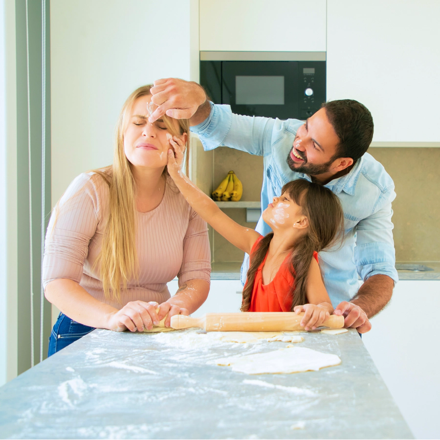 family playing dough on a kitchen